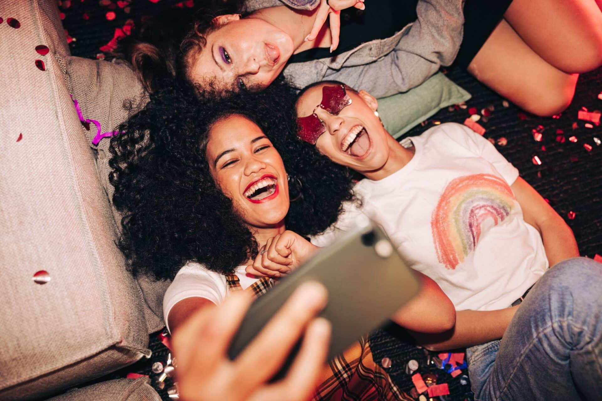 Vibrant,Selfies,For,Vibrant,People.,Overhead,View,Of,Three,Happy
